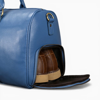 Élégant sac de voyage en cuir modèle Genève de la marque Élégance Cuir, affichant un design sophistiqué et intemporel.