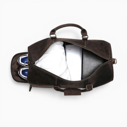 Sac de voyage en cuir pour homme modèle Monaco par Élégance Cuir, style duffel avec poignées et bandoulière.