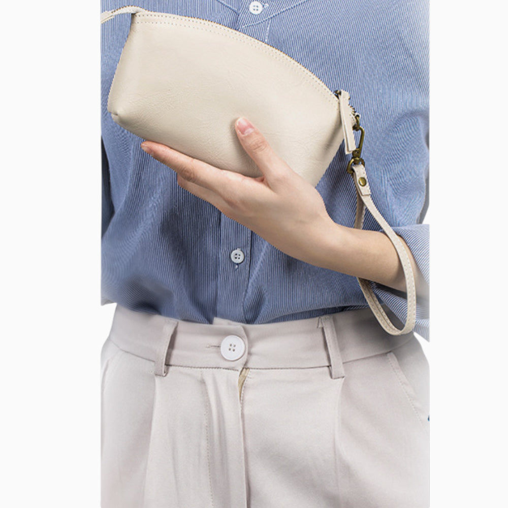 Compact leather fanny pack for women, Bijou model by Élégance Cuir, showcasing a stylish design and practical size.