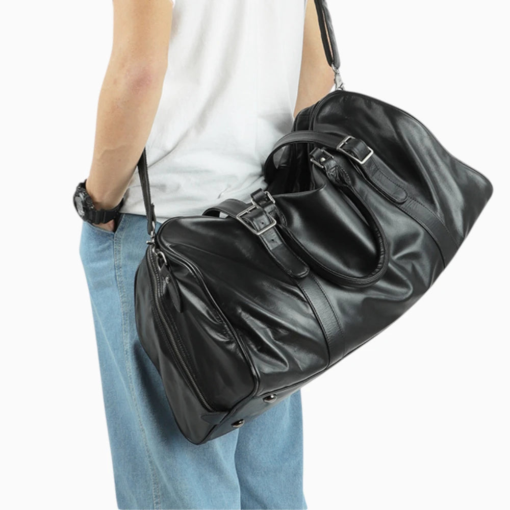 Vintage leather travel bag model Venise by Élégance Cuir, showcasing rich texture and classic design.