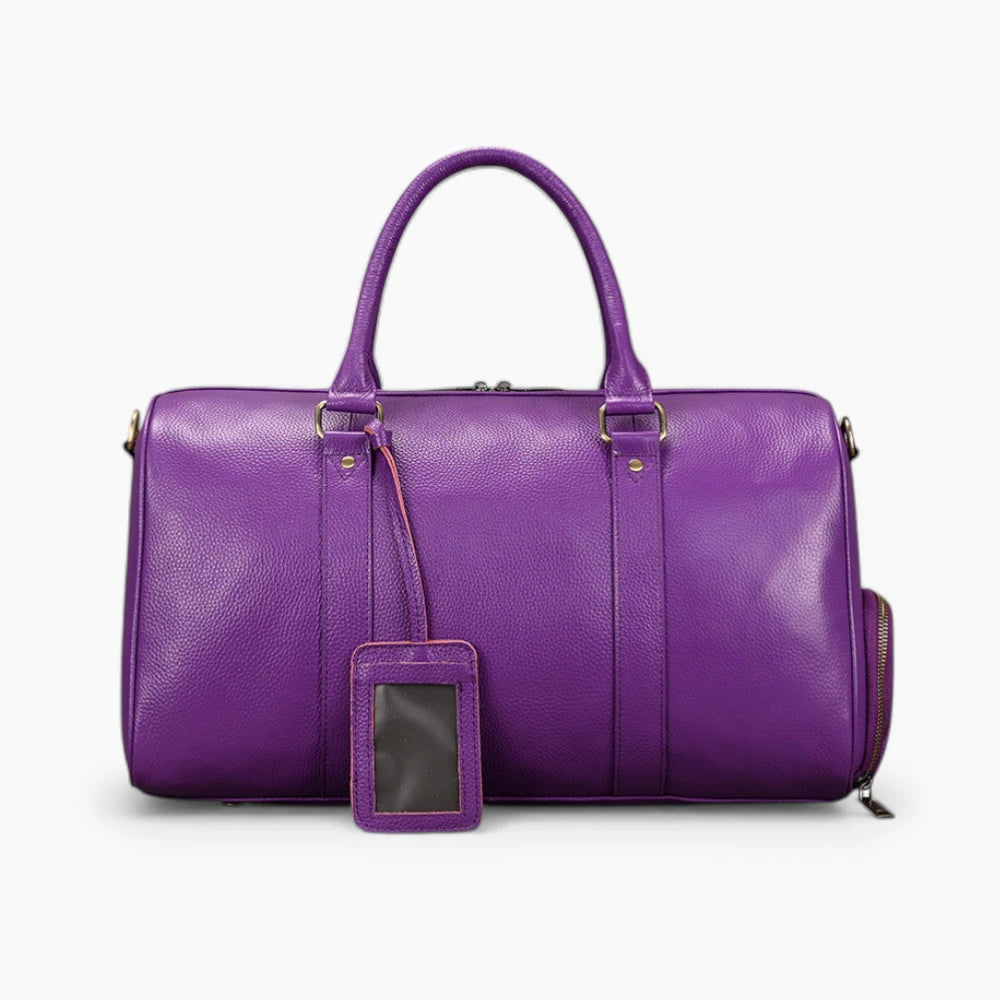 Élégant sac de voyage en cuir modèle Genève par Élégance Cuir, avec une finition lisse et des poignées robustes.