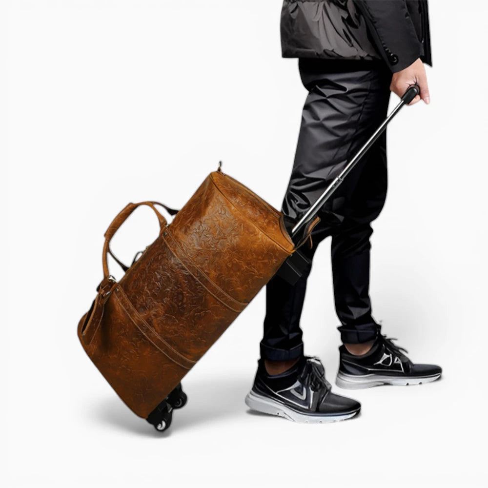 Sac de voyage en cuir à roulettes Élégance Cuir, modèle Cannes, avec surface lisse et roulettes pratiques.