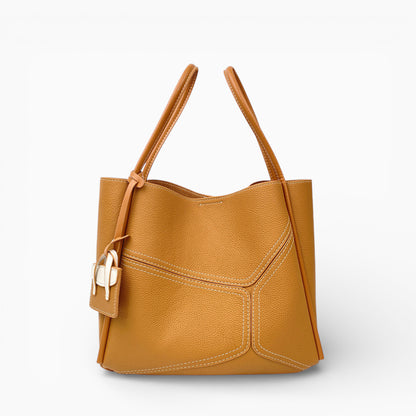 Sac bandoulière en cuir pour femme Clémence, format structuré, couleur élégante, avec anses et finitions raffinées.