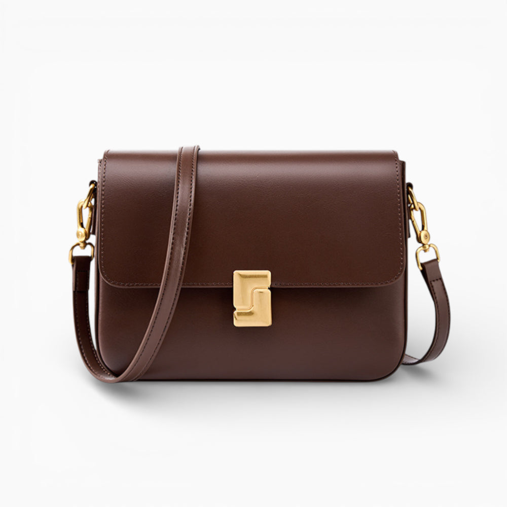 Sac bandoulière en cuir marron pour femme, modèle Céline avec rabat et fermoir métallique, vue de face.