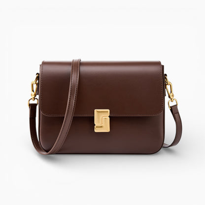 Sac bandoulière en cuir marron pour femme, modèle Céline avec rabat et fermoir métallique, vue de face.