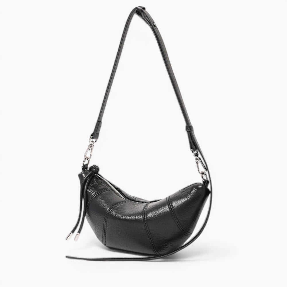 Sac à main en cuir demi-lune pour femme modèle Mademoiselle de la marque Élégance Cuir, couleur noir vue de coté