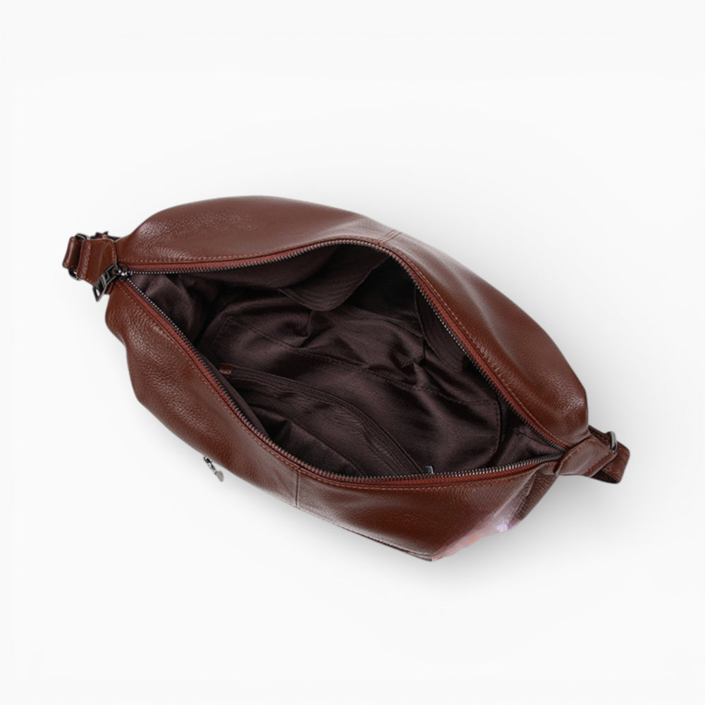 Large brown leather fanny pack for women, Rubis model by Élégance Cuir, showcasing interior details and spacious design.