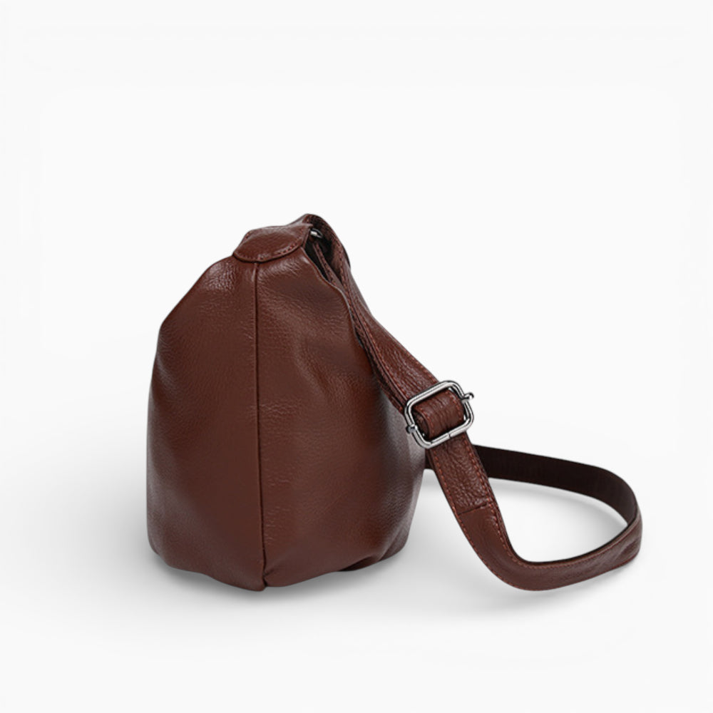 Large brown leather fanny pack for women, Rubis model by Élégance Cuir, shown from the side.