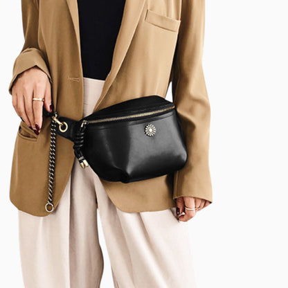 Chic leather fanny pack for women in emerald green, worn on a mannequin, by Élégance Cuir.