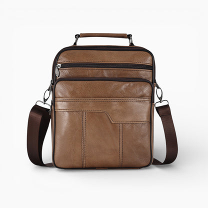 Sacoche bandoulière en cuir marron pour homme, format vertical avec poche zippée, modèle Alliance d'Élégance Cuir.